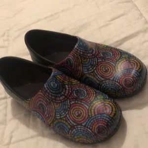 Multi colored Crocs clogs